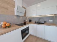 Kuchyňa alebo kuchynka v ubytovaní Apartament Południowy Gąski - 365PAM