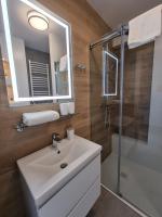 Kúpeľňa v ubytovaní Apartament Południowy Gąski - 365PAM