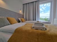 Posteľ alebo postele v izbe v ubytovaní Apartament Południowy Gąski - 365PAM