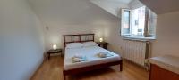 Posteľ alebo postele v izbe v ubytovaní Apartment Sunce