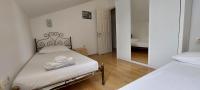 Posteľ alebo postele v izbe v ubytovaní Apartment Sunce