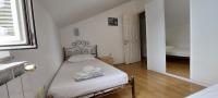 Posteľ alebo postele v izbe v ubytovaní Apartment Sunce