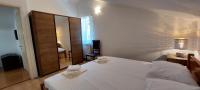 Posteľ alebo postele v izbe v ubytovaní Apartment Sunce