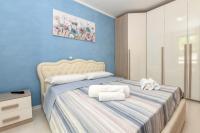 Posteľ alebo postele v izbe v ubytovaní My Desenzano Holiday Apartment