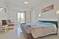 A bed or beds in a room at Fotini Studios