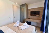 Łóżko lub łóżka w pokoju w obiekcie Villa Bella Vista 1