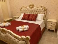 A bed or beds in a room at B&B Orchidea