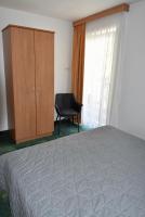 Łóżko lub łóżka w pokoju w obiekcie Yako Apartment - Wagrain Center