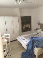 Postel nebo postele na pokoji v ubytování VILLA IL BLU direkt am Meer