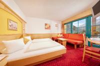 Posteľ alebo postele v izbe v ubytovaní Hotel Sunny Sölden
