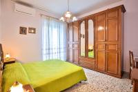 A bed or beds in a room at Apartment with 4 bedrooms in Amalfi