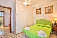 A bed or beds in a room at Apartment with 4 bedrooms in Amalfi