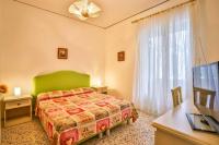 A bed or beds in a room at Apartment with 4 bedrooms in Amalfi