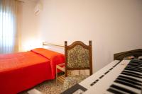 A bed or beds in a room at Apartment with 4 bedrooms in Amalfi