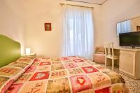 A bed or beds in a room at Apartment with 4 bedrooms in Amalfi