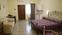 Postel nebo postele na pokoji v ubytování Masseria Lama D'impisa