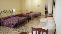 Postel nebo postele na pokoji v ubytování Masseria Lama D'impisa