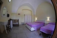 Postel nebo postele na pokoji v ubytování Masseria Lama D'impisa