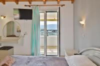 A bed or beds in a room at Fotini Studios