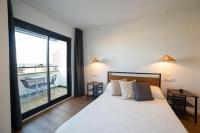 Postel nebo postele na pokoji v ubytování Apartaments Voralmar