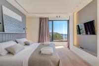 Postel nebo postele na pokoji v ubytování Luxury Villa Sunray 1