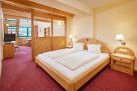 Posteľ alebo postele v izbe v ubytovaní Hotel Sunny Sölden