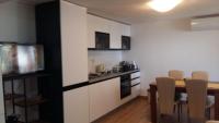 Kuchyňa alebo kuchynka v ubytovaní Apartmani Gojević