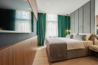 Posteľ alebo postele v izbe v ubytovaní Caldo Luxury Rooms