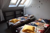 Posteľ alebo postele v izbe v ubytovaní Apartament Czos
