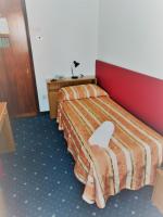 Łóżko lub łóżka w pokoju w obiekcie Hotel Kristall