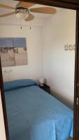 A bed or beds in a room at Apartment Parque Royale 1