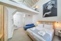 Lithorama Boutique Suitesにあるベッド