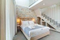 Lithorama Boutique Suitesにあるベッド