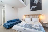 Lithorama Boutique Suitesにあるベッド