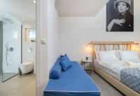 Lithorama Boutique Suitesにあるベッド