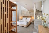 Lithorama Boutique Suitesにあるベッド