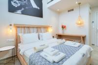 Lithorama Boutique Suitesにあるベッド