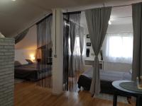 Posteľ alebo postele v izbe v ubytovaní Apartman Atelier