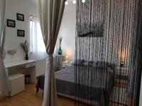 Posteľ alebo postele v izbe v ubytovaní Apartman Atelier