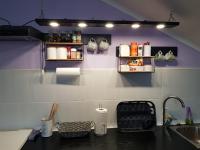 Kuchyňa alebo kuchynka v ubytovaní Apartman Atelier