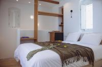 Postel nebo postele na pokoji v ubytování Amodara Boutique Villas-Naxos Boutique Luxury Private Villas