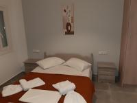 A bed or beds in a room at Villa Pappas