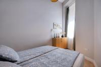 Posteľ alebo postele v izbe v ubytovaní New York Cafe Apartment in Center