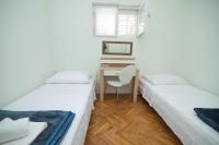 Postel nebo postele na pokoji v ubytování Villa Garina 1