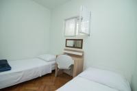 Postel nebo postele na pokoji v ubytování Villa Garina 1