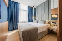 Posteľ alebo postele v izbe v ubytovaní Caldo Luxury Rooms