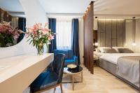 Posteľ alebo postele v izbe v ubytovaní Caldo Luxury Rooms