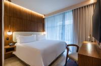 Elcielo Hotel Luxury Medellinにあるベッド