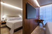 Elcielo Hotel Luxury Medellinにあるベッド