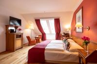 Ein Bett oder Betten in einem Zimmer der Unterkunft Hotel Gasthof Lercher